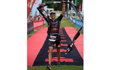 Wounded champion defends IRONMAN 70.3 title in Taupo