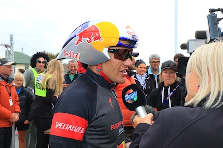 NZME's Lesley Murdoch interviews Coast to Coast One Day World Championship winner Wanaka athlete Braden Currie at the finish line in the Christchurch seaside suburb of New Brighton.