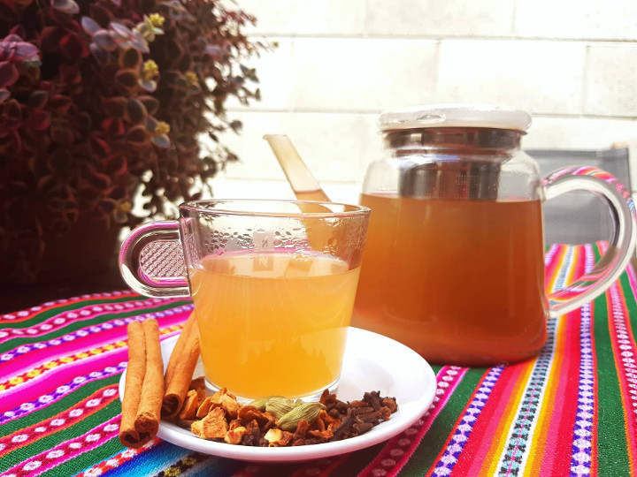 A traditional maca tea brewed with cinnamon, cloves, cardamom, dried apple and maca