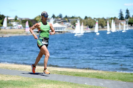 American Meredith Kessler, running along the Lake Taupo foreshore, is top seed for IRONMAN New Zealand next month in Taupo. Credit: Delly Carr