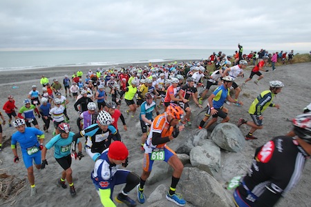  Coast to Coast competitors in this year's two day event get underway on the first day on Kumara beach on the South Island's West Coast.  Credit: Marathon-Photos.com.
