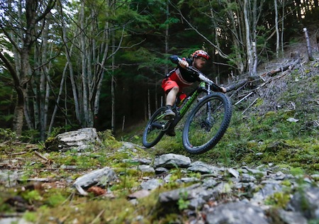 Jimmy Pollard on his way to winning the men's open category in the Vertigo Bikes Super D Enduro, first event of the 2015 Queenstown Bike Festival.  Credit: riverleaphotography.com.