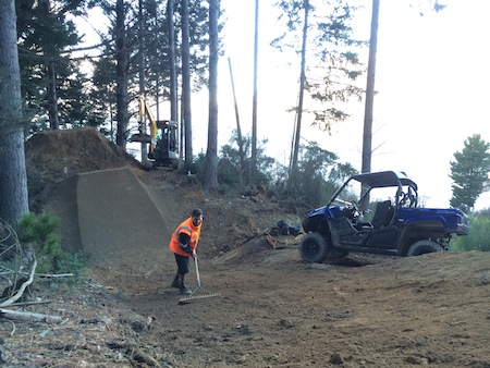 The Skyline Queenstown crew get stuck in to a new step-up feature on the Original trail.
